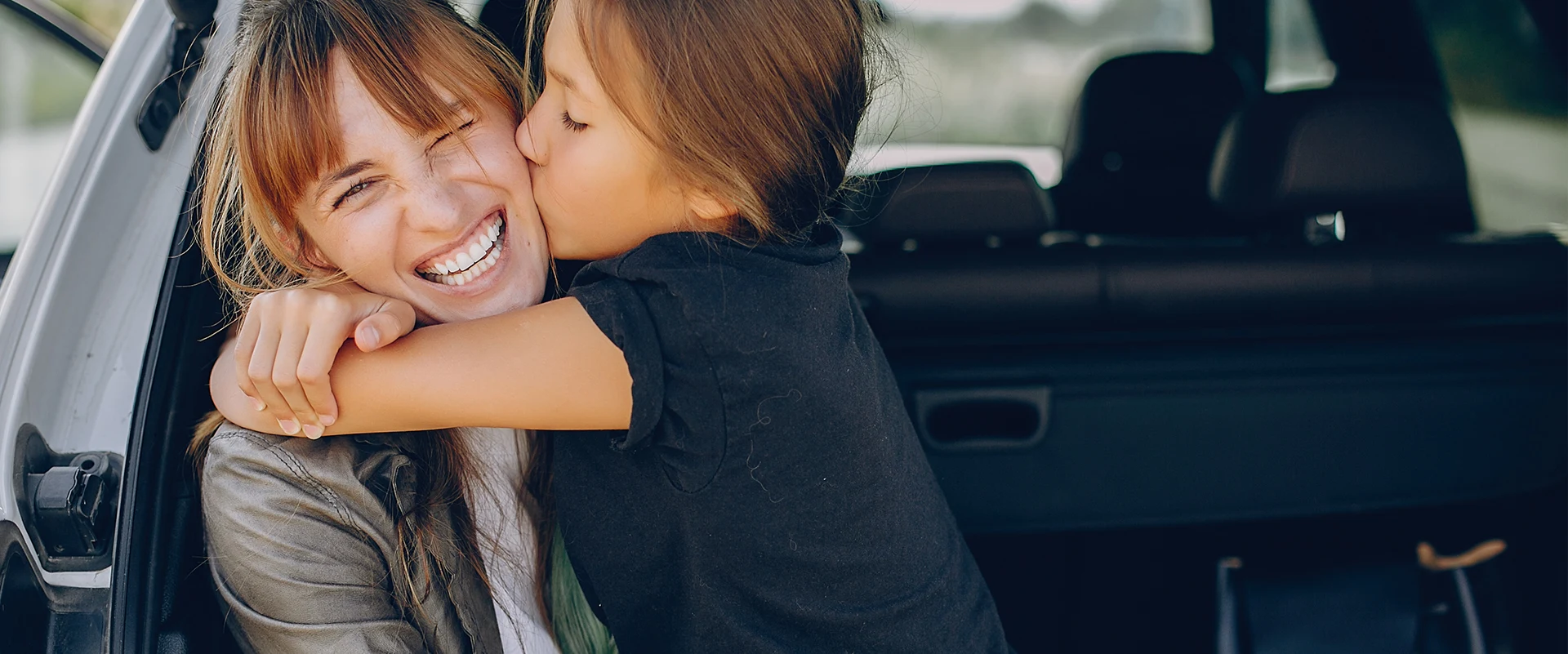 Mother and daugher in their car